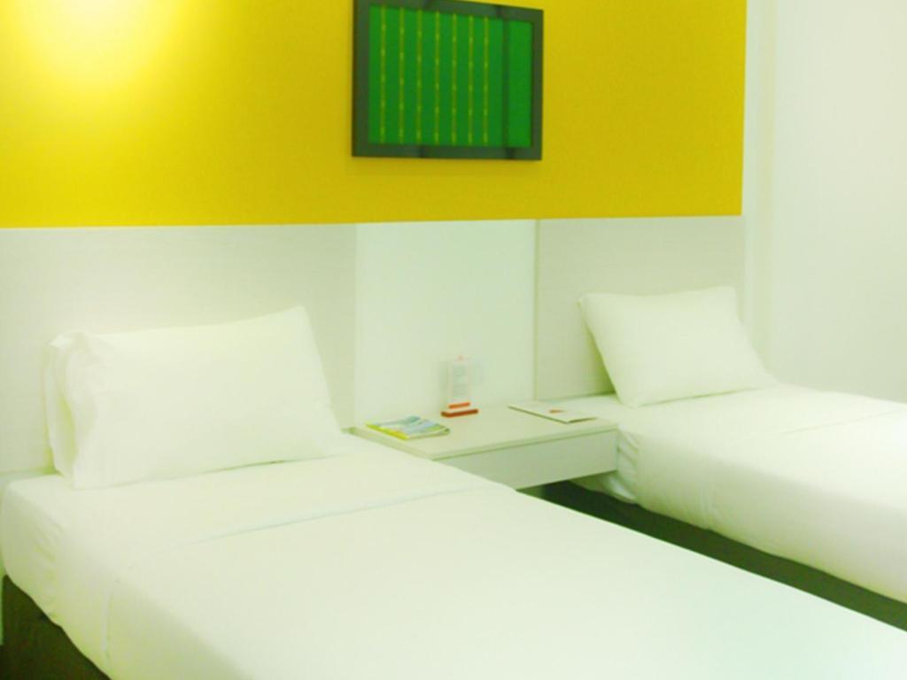 Dragon Inn Kendari Habitación foto