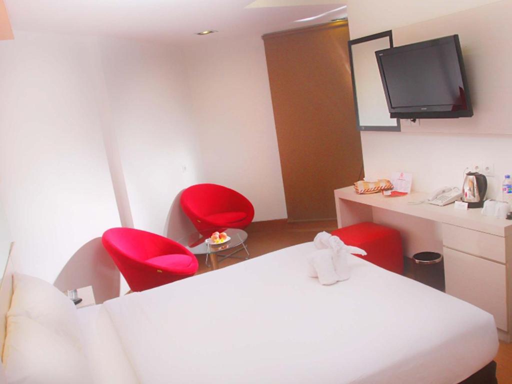 Dragon Inn Kendari Habitación foto